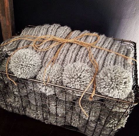 Chunky gray knit blanket with large pom poms by EandAHeritage, $390.00 | Knitted blankets ...