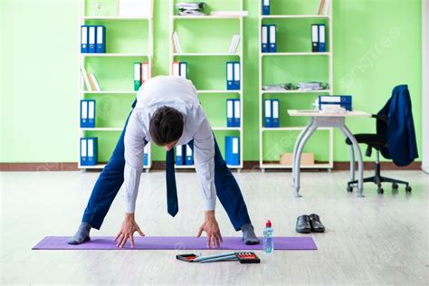 Employee Doing Exercises During Break At Work Photo Background And Picture For Free Download ...