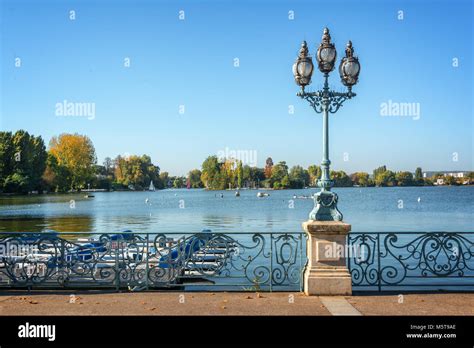 Old vintage street lamp on the lake of Enghien les Bains near Paris, France Stock Photo - Alamy