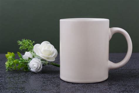 White coffee mug mockup with white roses