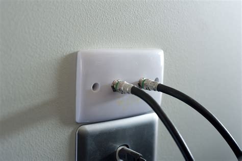 Free Image of Wall socket with TV cables | Freebie.Photography