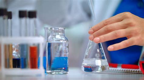 Chemical Reaction In Lab Flask Close Up Of Stock Footage SBV-313109081 ...