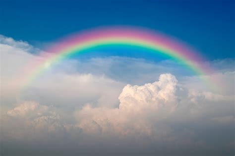 Premium Photo | Cloudscape with blue sky and white clouds rainbow