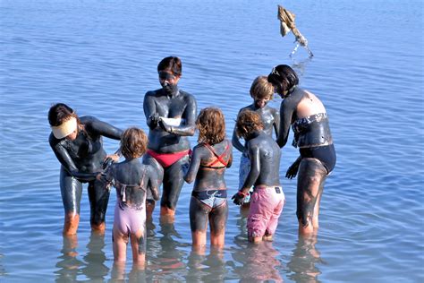 Mud Bath in Dead Sea in Israel - Encircle Photos