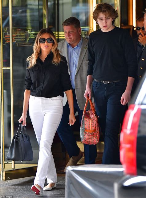 Barron Trump, 15, towers over his mother Melania as the mother-son duo ...