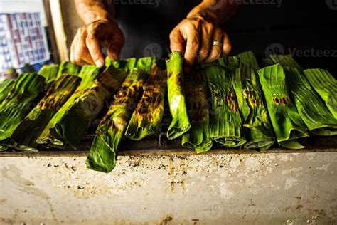 otak - otak is a food made from minced mackerel fish meat wrapped in banana leaves, baked, and ...