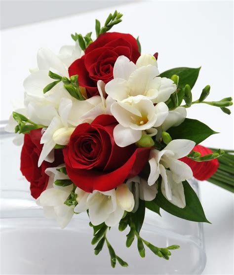 This bouquet has three sensational roses surrounded by beautiful mixed ...