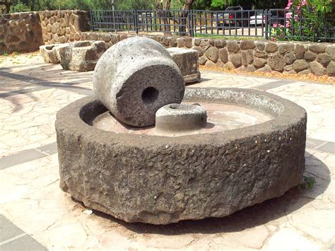 An ancient olive oil press aka a GETHSEMANE. A long pole is inserted ...