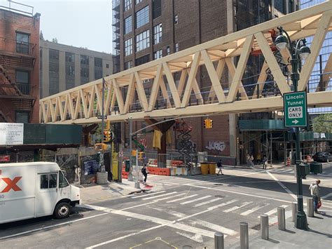 300-foot timber bridge connecting the High Line and Moynihan Train Hall has been installed | 6sqft