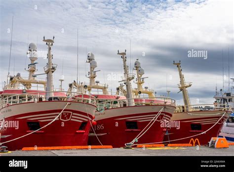 Killybegs, Ireland - 14 July, 2022: three red fishing trawlers in the ...