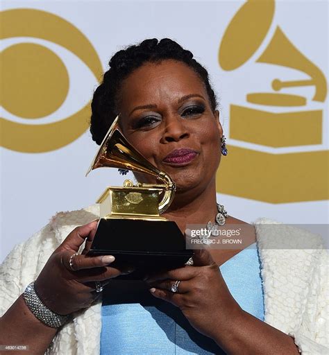 Dianne Reeves holds her Grammy for Best Jazz Vocal Album, "Beautiful ...