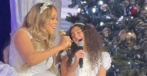 Mariah Carey Performs With Daughter Monroe, 12, At Holiday Concert