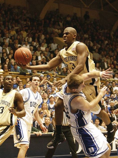 Chris Paul of the Wake Forest Demon Deacons is fouled by Lee... | Wake ...