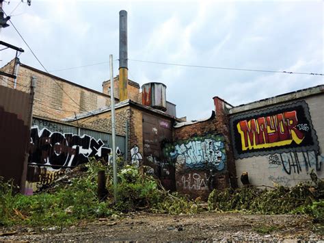 Urban ghetto in the alley with graffiti - landscape photo - DFW Pressure Works