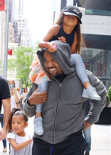 Kanye West is seen leaving his hotel with his daughter North West, who ...