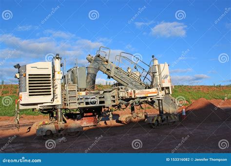 Concrete Paving Machine on a Road Construction Site Stock Photo - Image of stone, legs: 153316082