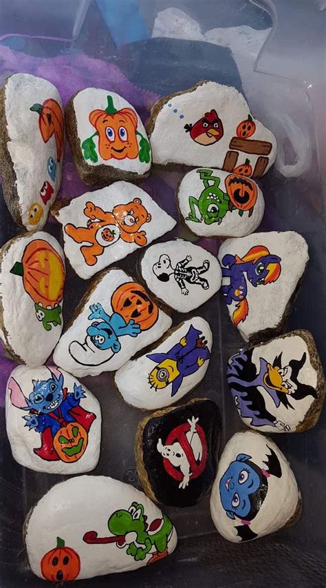 All different Cartoon characters Halloween inspired free hand painted rocks | Hand painted rocks ...