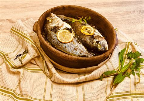 Gilt-head bream, delicious fish in clay pot by Greek Goes Keto