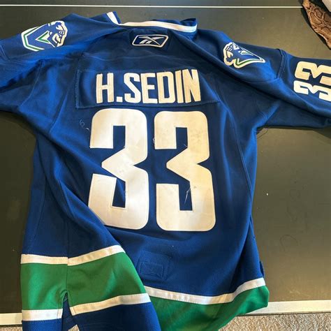 Vancouver canucks throwback jersey - Depop