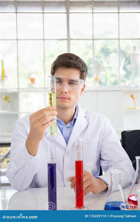 Male Scientist Working in a Science Lab with Various Equipment in the ...