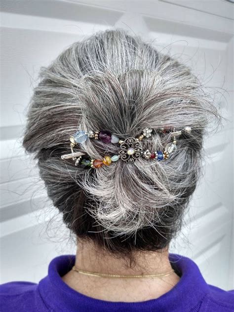 I love the "Freestyle" Flexi clip in the elegant gray hair bun hairstyle! Simply lovely and oh ...