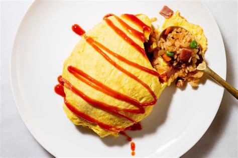 Omurice, a beloved staple of Japanese home cooking, is a linguistic and literal mash-up of ...