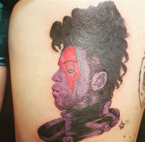 19 pretty epic Prince tattoos making us want to queue up 'Purple Rain'