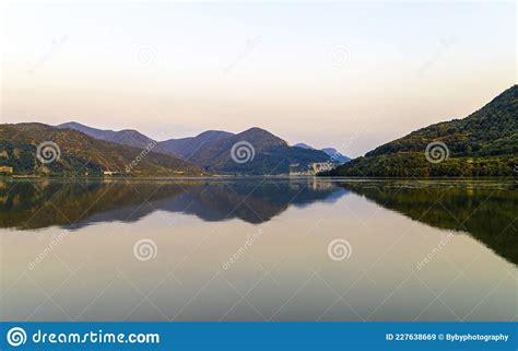 The Danube River at Sunset with the Reflection of the Hills in the ...