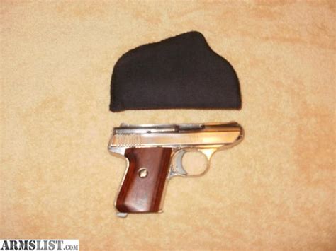 ARMSLIST - For Sale: Jennings chrome 22 LR Pistol W/Holster Wood Grips ...