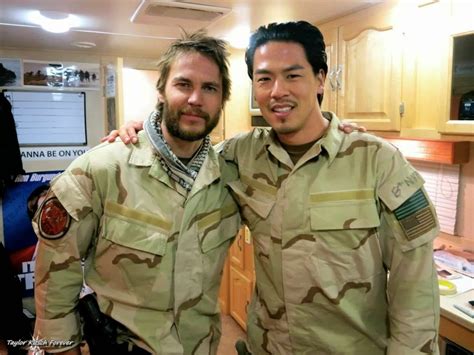 Movie "Lone survivor" 2013 - Director: Peter Berg. Taylor Kitsch as Michael Murphy. (Behind ...