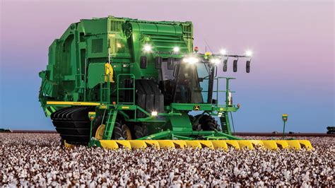 JOHN DEERE'S COTTON STRIPPERS AND COTTON PICKERS