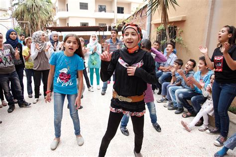 File:Dancing and singing to forget the pain of Syrias conflict ...