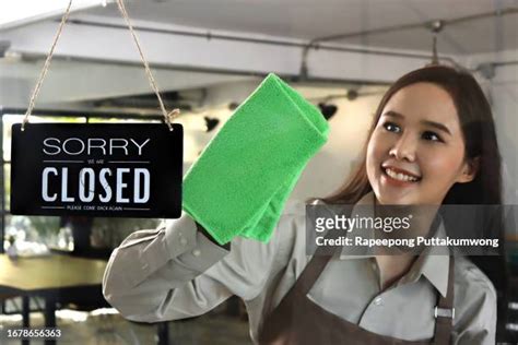 Cleaning Storefront Window Photos and Premium High Res Pictures - Getty ...