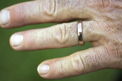 Closeup Of A Wedding Ring On A Man's Hand Royalty Free Stock Images ...