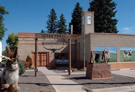 Jack is outside the Texas Trail Museum in Pine Bluffs, Wyoming! | Wyoming travel, Wyoming, Local ...