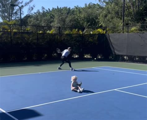 Watch: Caroline Wozniacki practices while baby Olivia calmly sits on ...