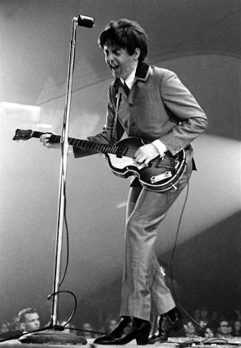 Mr. Paul McCartney of The Beatles playing his bass during the band’s ...