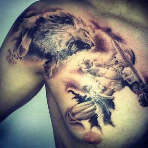 warrior fighting lion tattoo on chest and shoulder - Tattooimages.biz Lion Tattoo Design, Tattoo ...