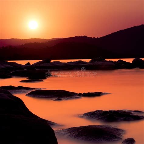 Golden Sunset Over Shallow Water Stock Image - Image of stone, dusk: 32409015