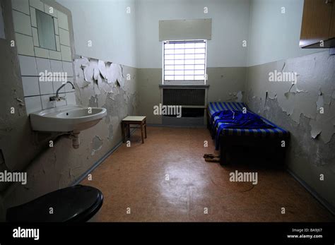 Prison cell, former East German Stasi prison of Hohenschoenhausen ...