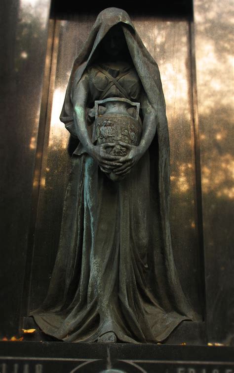 Beautiful yet mysterious crypt statue | Cemetery statues, Cemetery ...