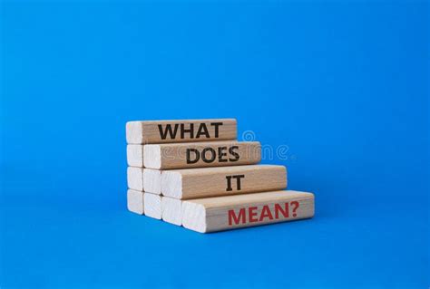 What Does it Mean Symbol. Wooden Blocks with Words What Does it Mean. Beautiful Blue Background ...