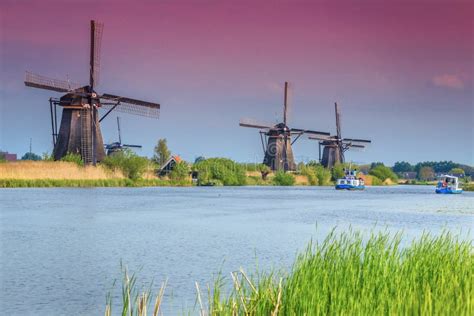 Spectacular Windmills in Kinderdijk Museum with Colorful Sunset, Netherlands, Europe Stock Photo ...