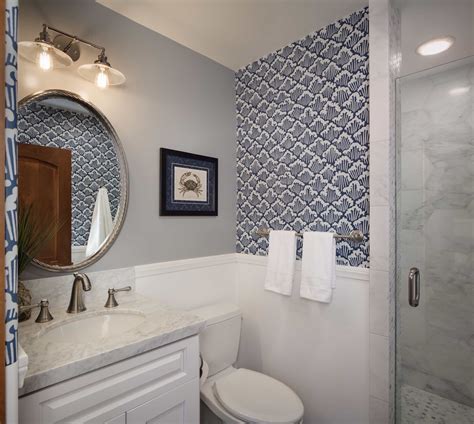 Blue and Gray Coastal Bathroom With Wave Wallpaper