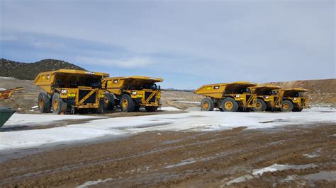 Caterpillar 793F Haul Trucks Parked At The Mine - Motor Mission Machine ...