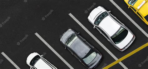 Premium Photo | Top view of Cars on parking lot