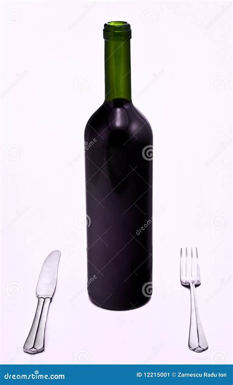 Bottle Of Red Wine With Knife And Fork Stock Image - Image: 12215001