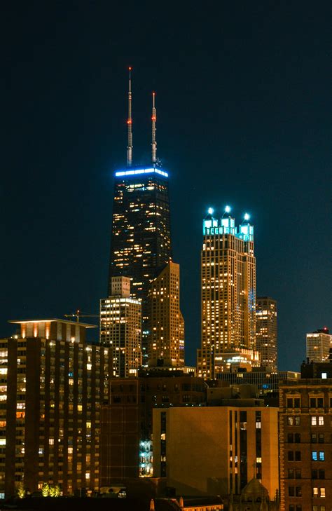 High-rise Building at Night Time · Free Stock Photo