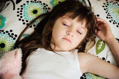 Portrait of sleeping little girl in bed — Stock Photo © alinute #11717703