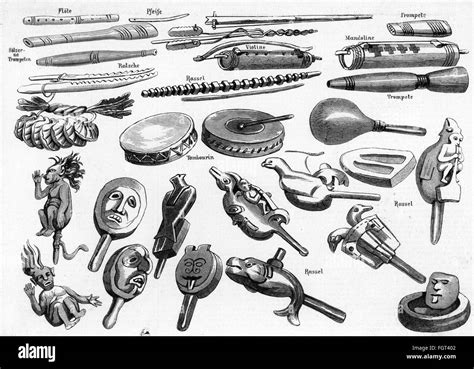 Rattle musical instrument Black and White Stock Photos & Images - Alamy